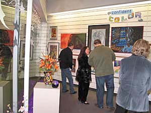 visitors enjoying artwork